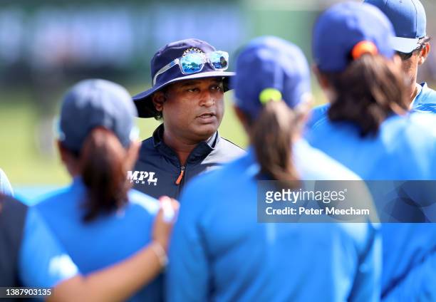 Indian Womens Cricket head coach Ramesh Powar speaks to the team before the 2022 ICC Women's Cricket World Cup match between India and South Africa...