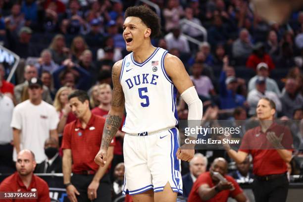 Paolo Banchero of the Duke Blue Devils celebrates after a play during the first half against the Arkansas Razorbacks in the NCAA Men's Basketball...