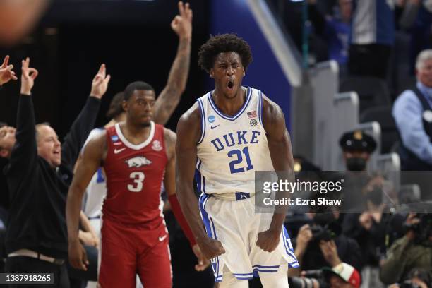 Griffin of the Duke Blue Devils celebrates after making a 3-point shot during the second half against the Arkansas Razorbacks in the NCAA Men's...
