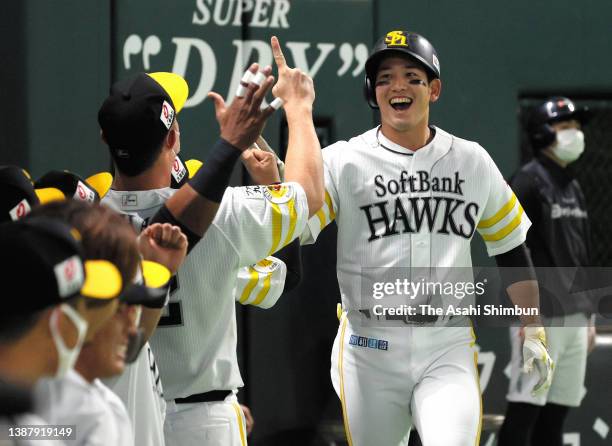 Ryoya Kurihara of the Fukuoka SoftBank Hawks celebrates with his team mates after hitting a solo home run in the 2nd inning against Hokkaido...