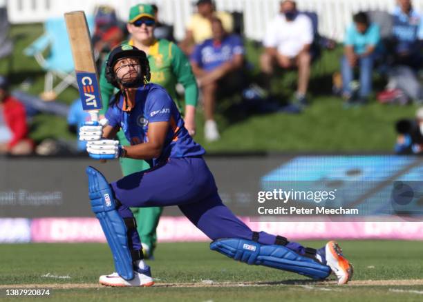 Harmanpreet Kaur from India in action during the 2022 ICC Women's Cricket World Cup match between India and South Africa at Hagley Oval on March 27,...