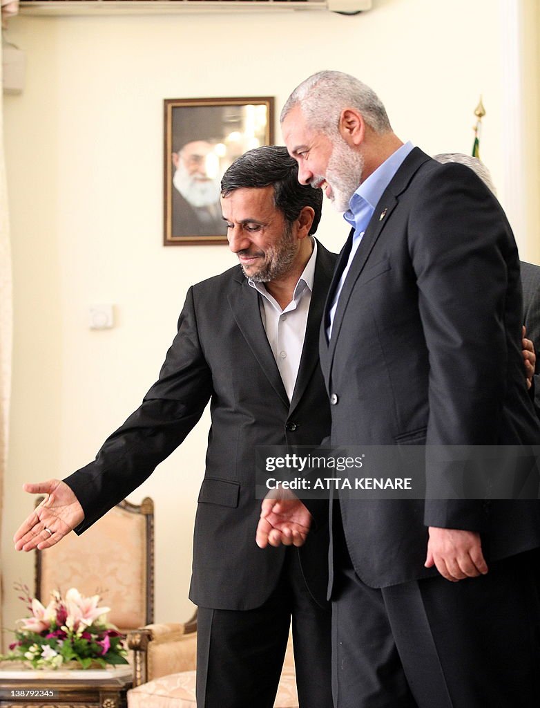 Iranian President Mahmoud Ahmadinejad (L