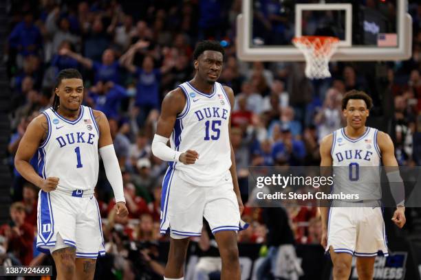 Trevor Keels, Mark Williams, and Wendell Moore Jr. #0 of the Duke Blue Devils react during the second half against the Arkansas Razorbacks in the...