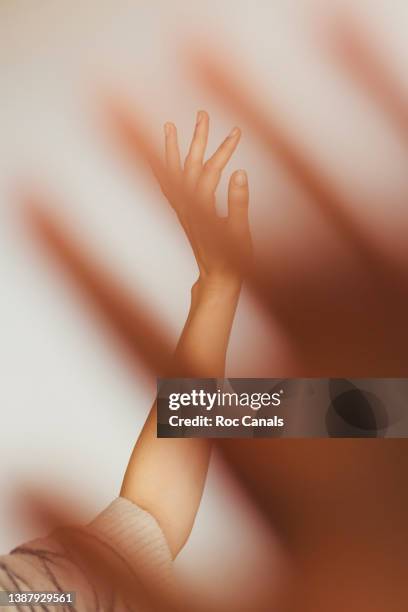 censored hand - touching fabric stock pictures, royalty-free photos & images