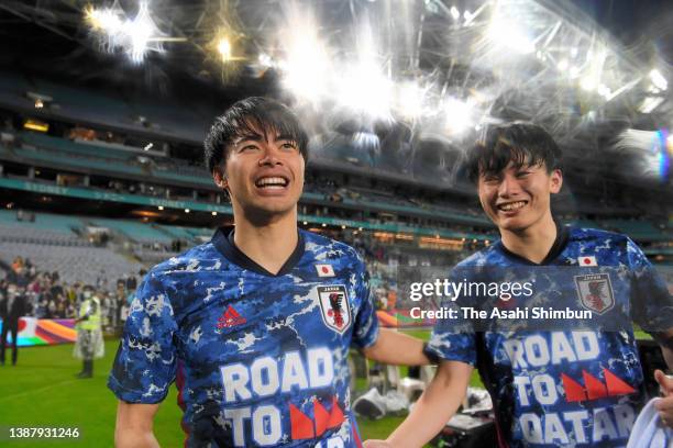 Kaoru Mitoma and Ayase Ueda of Japan celebrate their qualification to the World Cup following the 2-0 victory in the FIFA World Cup Asian Qualifier...