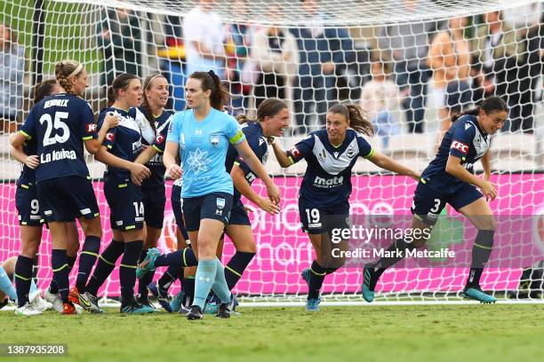 The Victory celebrate after Amy Jackson of the Victory scored a goal during the A-League Womens Grand Final match between Sydney FC and Melbourne...