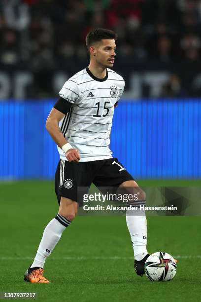 Julian Weigl of Germany runs with the ball during the international friendly match between Germany and Israel at PreZero-Arena on March 26, 2022 in...
