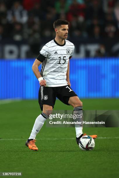 Julian Weigl of Germany runs with the ball during the international friendly match between Germany and Israel at PreZero-Arena on March 26, 2022 in...