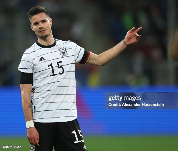 Julian Weigl of Germany reacts during the international friendly match between Germany and Israel at PreZero-Arena on March 26, 2022 in Sinsheim,...