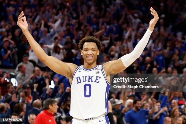 Wendell Moore Jr. #0 of the Duke Blue Devils celebrates after defeating the Texas Tech Red Raiders with a final score of 73-78 in the Sweet Sixteen...