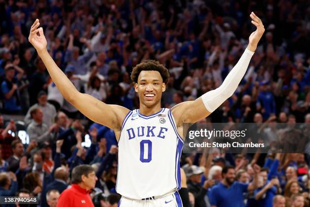 Wendell Moore Jr. #0 of the Duke Blue Devils celebrates after defeating the Texas Tech Red Raiders with a final score of 73-78 in the Sweet Sixteen...