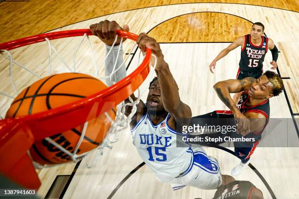 Mark Williams of the Duke Blue Devils dunks the ball against the Texas Tech Red Raiders during the second half in the Sweet Sixteen round game of the...