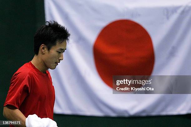 Go Soeda of Japan plays in his singles match against Ivo Karlovic of Croatia during day three of the Davis Cup World Group 1st Round match between...