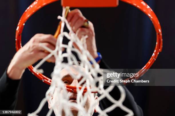 Head coach Mike Krzyzewski of the Duke Blue Devils cuts down the net after defeating the Arkansas Razorbacks 78-69 during the second half in the NCAA...