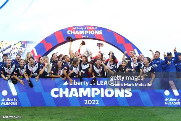 The Victory celebrate during the presentation ceremony after winning the A-League Womens Grand Final match between Sydney FC and Melbourne Victory at...