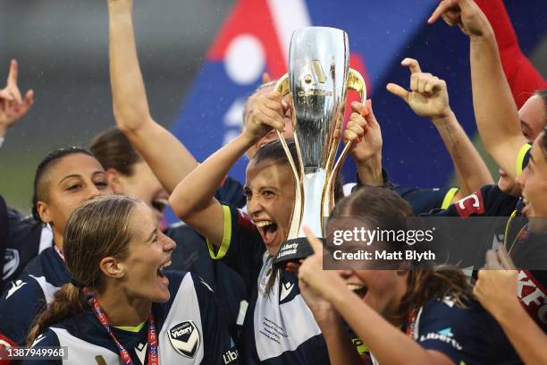 Victory captain Lia Privitelli celebrates with the Championship Trophy after winning the A-League Womens Grand Final match between Sydney FC and...