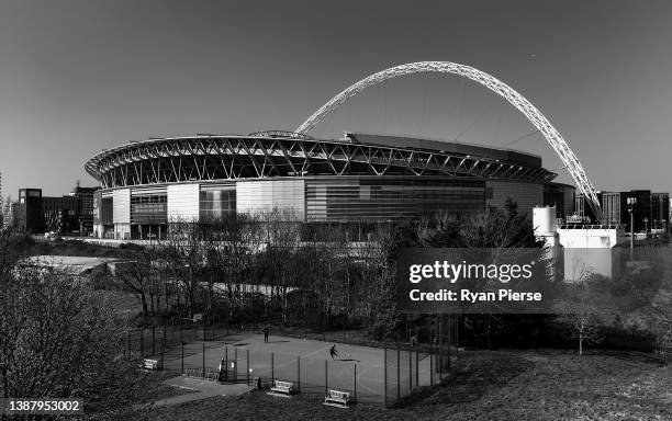An aerial view of people playing football outside Wembley Stadium prior to the international friendly match between England and Switzerland at...