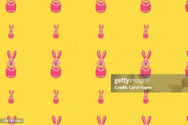 easter rabbit seamless pattern in pink and yellow - pets icon blue stock pictures, royalty-free photos & images