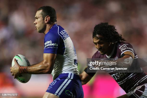 Brent Naden of the Bulldogs runs the ball during the round three NRL match between the Manly Sea Eagles and the Canterbury Bulldogs at 4 Pines Park,...