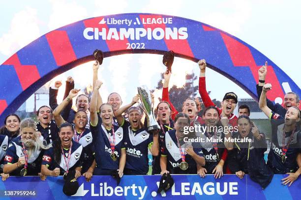 The Victory celebrate during the presentation ceremony after winning the A-League Womens Grand Final match between Sydney FC and Melbourne Victory at...