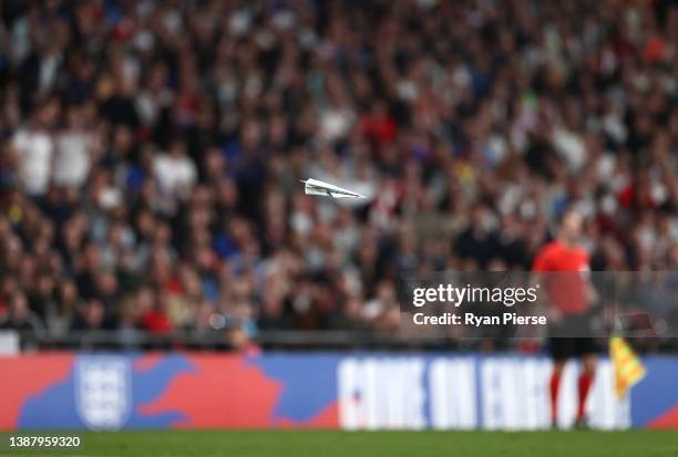 Paper plane is seen during the international friendly match between England and Switzerland at Wembley Stadium on March 26, 2022 in London, England.