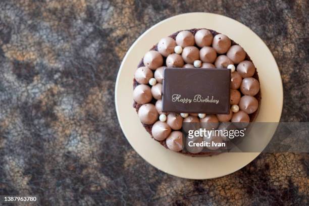 high angle view of  chocolate birthday cake - gateaux bildbanksfoton och bilder