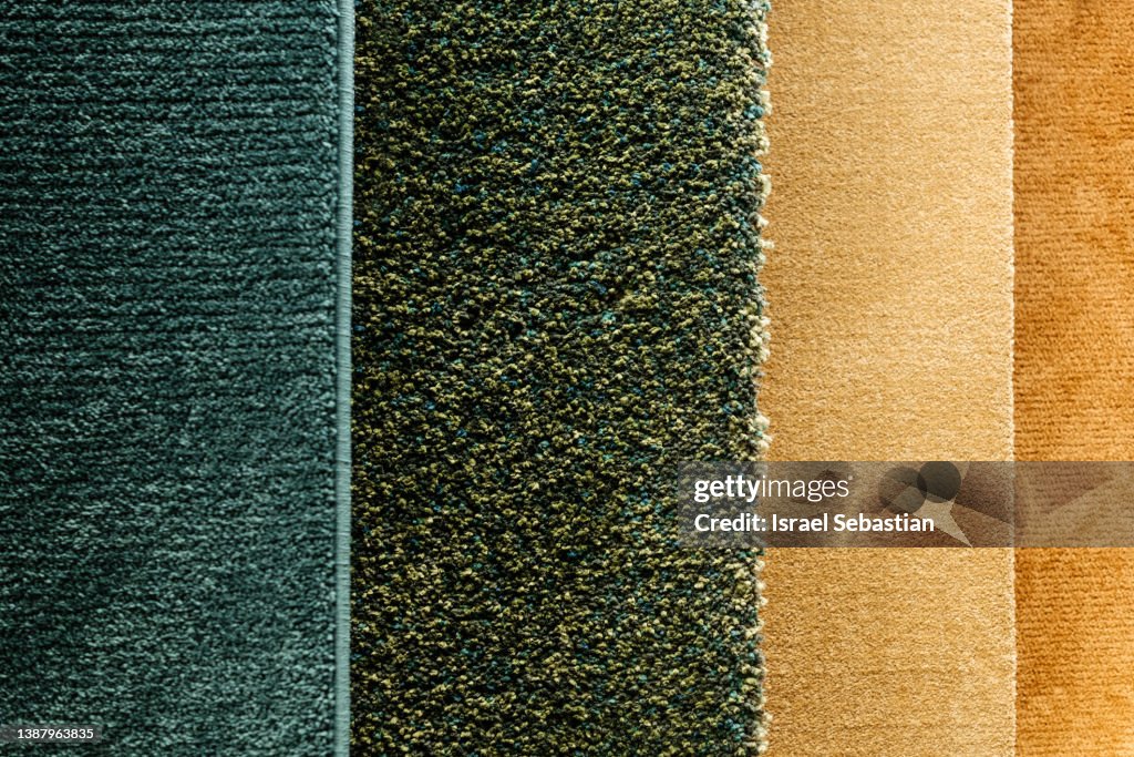 Close-up of a group of hanging carpets.