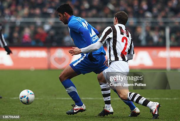 Moritz Volz of St. Pauli and Mirkan Aydin of Bochum battle for the ball during the Second Bundesliga match between FC St. Pauli and VfL Bochum at the...