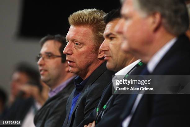 Boris Becker and Carl-Uwe Steeb watch the match between Florian Mayer of Germany and Juan Ignacio Chela of Argentina on day 3 of the Davis Cup World...