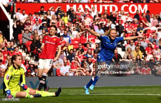 Claire Emslie of Everton celebrates after scoring their team's first goal during the Barclays FA Women's Super League match between Manchester United...