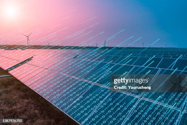binary code flowing on the solar panel surface,concept photo"r - power grid stock-fotos und bilder