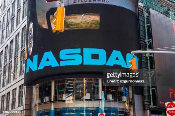 close up view of lcd billboard of the nasdaq marketsite - nasdaq stock pictures, royalty-free photos & images