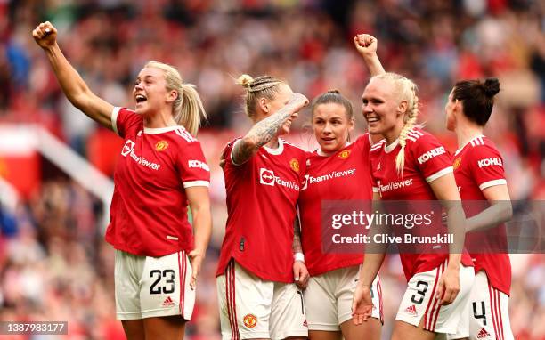 Alessia Russo of Manchester United celebrates with teammates after scoring their team's third goal during the Barclays FA Women's Super League match...