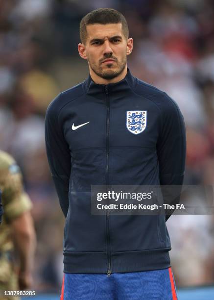 Conor Coady of England stands for the national anthem prior to the international friendly match between England and Switzerland at Wembley Stadium on...