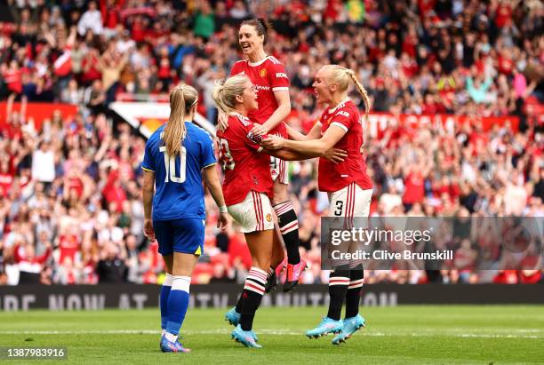 Alessia Russo of Manchester United celebrates with Jade Moore and Maria Thorisdottir after scoring their team's third goal during the Barclays FA...