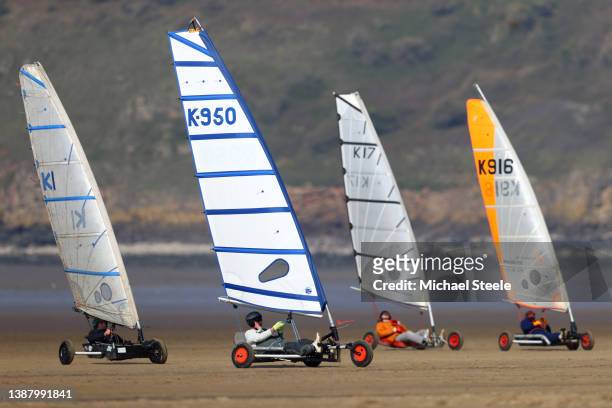 Competitors in the Class Mini event during the opening round of the British Landsailing Championship Series on March 27, 2022 in Brean Sands, England.