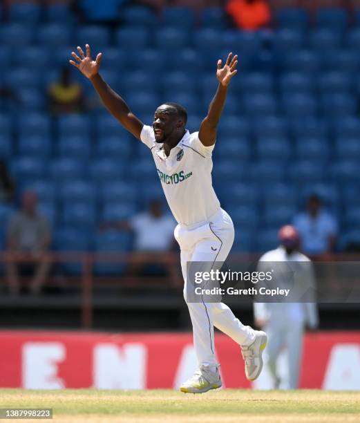 Kemar Roach of the West Indies successfully appeals for the wicket of Jack Leach of England during day four of the 3rd Test match between the West...