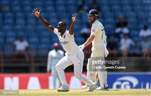 Kemar Roach of the West Indies successfully appeals for the wicket of Jack Leach of England during day four of the 3rd Test match between the West...