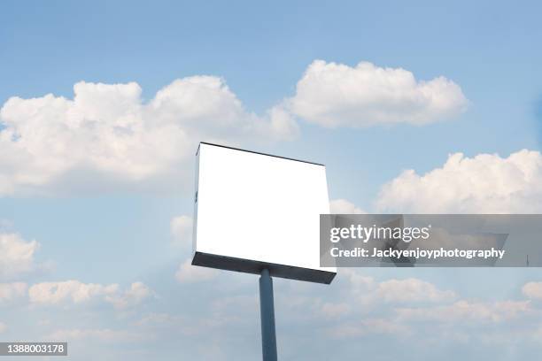 blank advertising screen against soft blue sky - electronic billboard bildbanksfoton och bilder