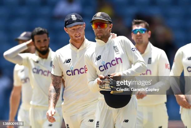 England captain Joe Root is consoled by Ben Stokes after losing the 3rd Test match between the West Indies and England at National Cricket Stadium on...
