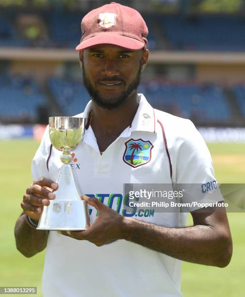 Kraigg Brathwaite with the series trophy after West Indies won the third Test against England at National Cricket Stadium on March 27, 2022 in...