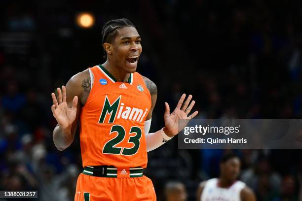 Kameron McGusty of the Miami Hurricanes reacts after a basket against the Kansas Jayhawks during the first half in the Elite Eight round game of the...