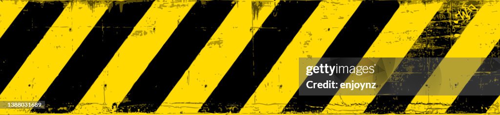 Danger! Seamless yellow and black grunge warning lines