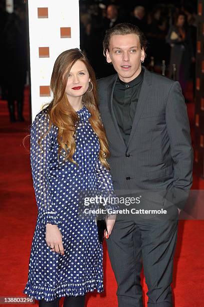 Actress Bonnie Wright and actor Jamie Campbell Bower attend the Orange British Academy Film Awards 2012 at the Royal Opera House on February 12, 2012...