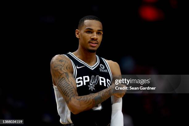 Dejounte Murray of the San Antonio Spurs stands on the court prior to the start of an NBA game against the New Orleans Pelicans at Smoothie King...