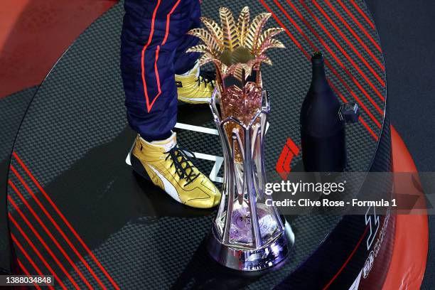 Detail shot of the feet and winners trophy of Race winner Max Verstappen of the Netherlands and Oracle Red Bull Racing on the podium during the F1...