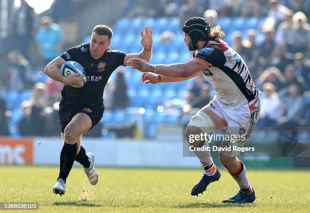 Joe Simmonds of Exeter Chiefs is held by Harry Wells during the Gallagher Premiership Rugby match between Exeter Chiefs and Leicester Tigers at Sandy...