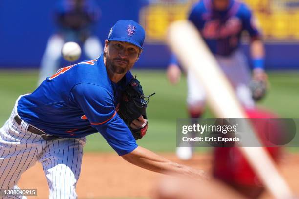 Jacob deGrom of the New York Mets throws a pitch during the third inning of the Spring Training game against the St. Louis Cardinals at Clover Park...