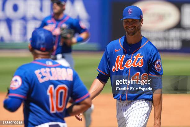 Jacob deGrom of the New York Mets smiles as he exits the field after the third inning of the Spring Training game against the St. Louis Cardinals at...