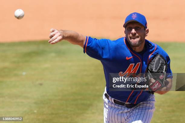 Max Scherzer of the New York Mets throws a pitch during the fourth inning of the Spring Training game against the St. Louis Cardinals at Clover Park...